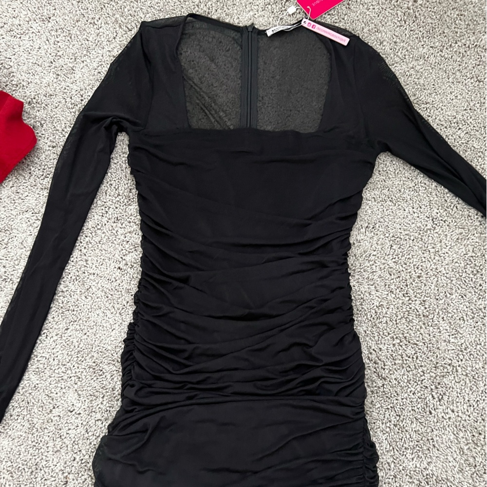 Black, mesh long sleeve dress from Beginning Boutique!